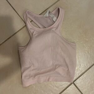 Pink ribbed lululemon cropped sports tank. Good condition, worn a few times.